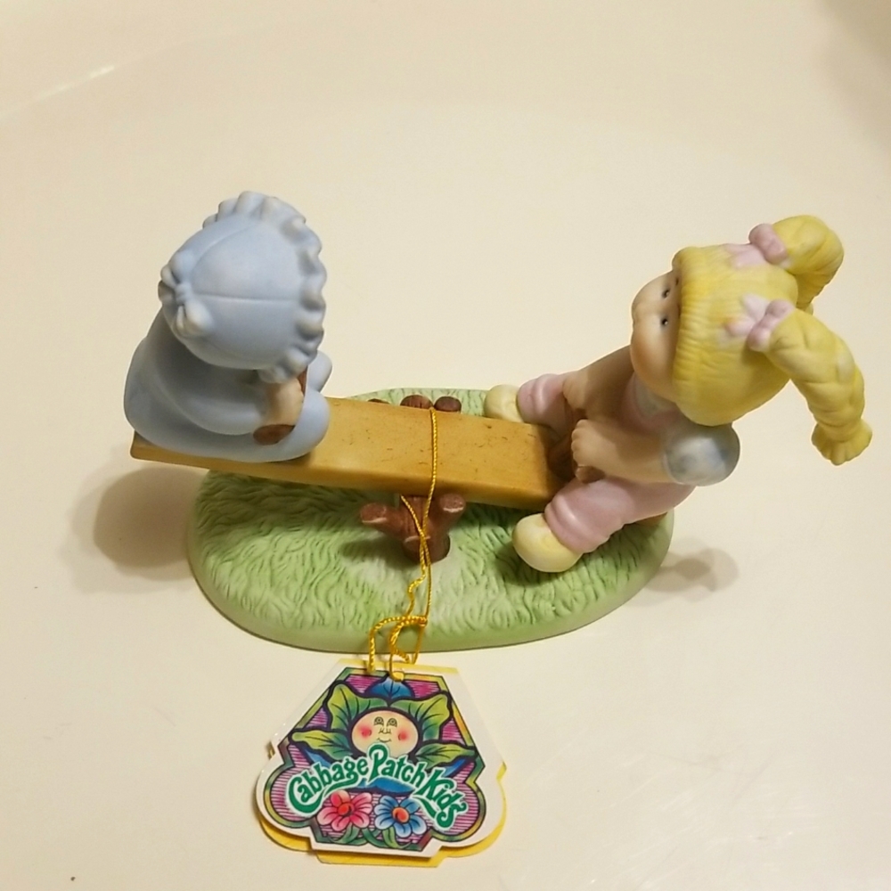 Cabbage patch figurine on teeter totter 1984
